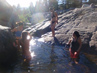 Going swimming at a swim hole after a hot day climbing...