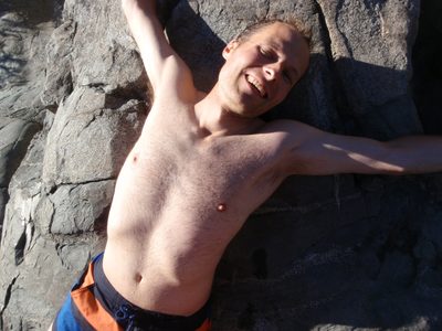 John, trying to warm up on the rock.