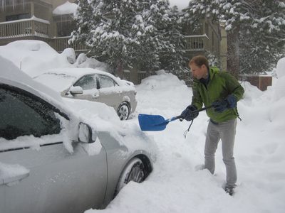 John, using a shovel in lieu of an ice scraper.
