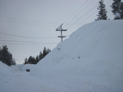 Snowbank that is higher than the electrical wires...