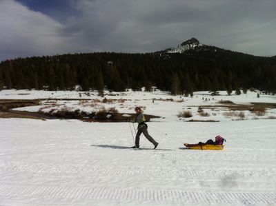 Karla (mom) towing Samara. Clouds in the distance...