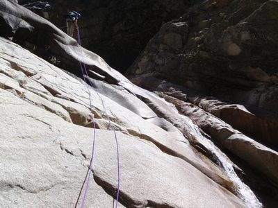 Monica, starting the fourth rappel.