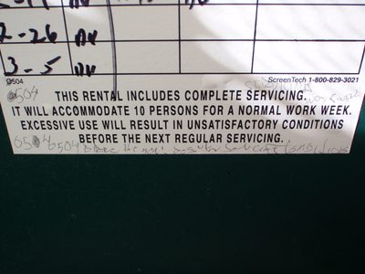 A sign inside the port-o-potty at the crayfish boil. ...
