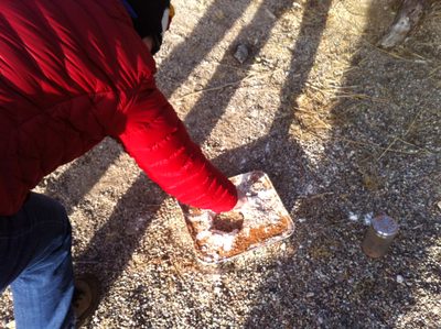 Catherine making moon craters from dropping rocks into...