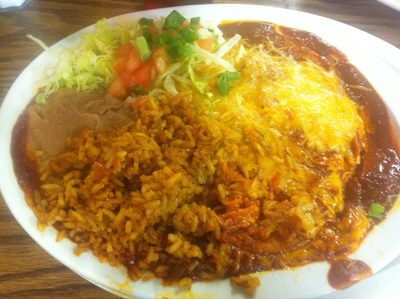 Red chili enchilada plate at Poco & Mom's w/ homemade...