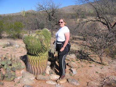 Mom next to a weird type of saguaro that occurs in...