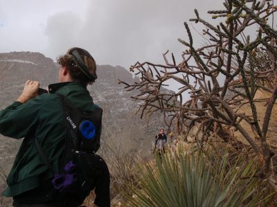 Peter with snow in his hair and some sort of cholla and an agave.