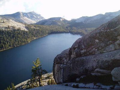 Tenaya Lake on the hike down -- Half Dome faintly...