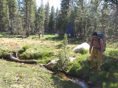 Monica crossing a tiny stream on our cross-country...