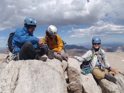 Enjoying the cramped space on the summit.