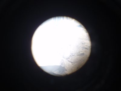 An attempt to take a photo through a telescope of a team...