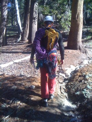 John, hiking in on the approach to West Crack (5.9) on...