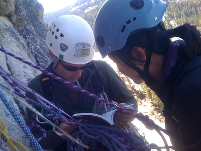 John consulting the guide book before starting pitch 2,...