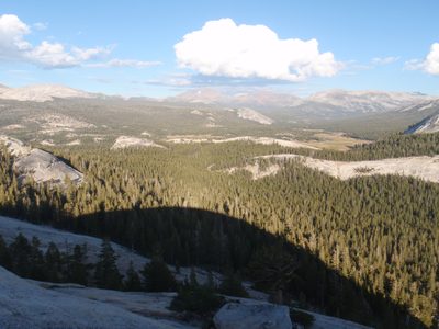 DAFF Dome casts its shadow to the east. Tuolumne Meadows...