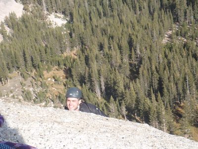 Alex rounding the top of pitch 4.