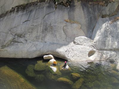 Aditi and Eliah find a rock to warm up on while the rest...