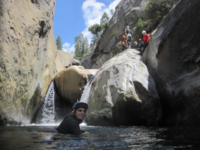 Joel at the bottom of the next jump with John, Monica,...