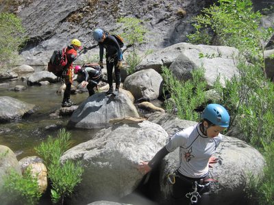 John, Aditi, Monica and Tracy move down river through a...