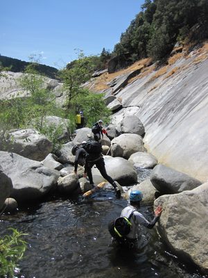 Joel leads a bunch of others down a more riparian...