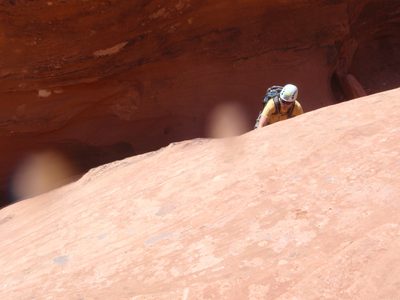 Andy, utilizing some rock climbing skills to get up to a...