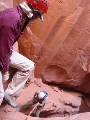 Turtle watches Andy on a short rappel.