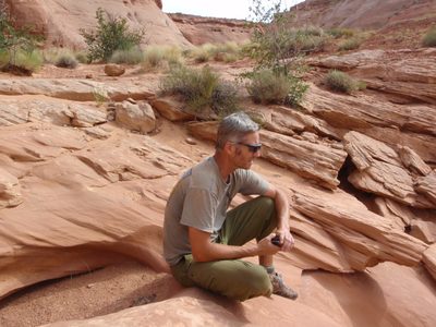 Andy sitting near the top of Lucky Charms canyon.