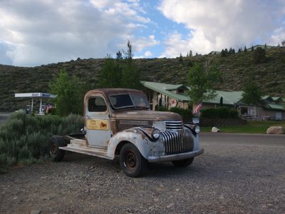 Old pickup parked outside the Mobil Mart.