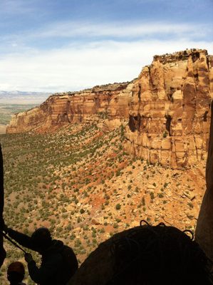 Rappelling from the top of the second pitch. 2 unknown...
