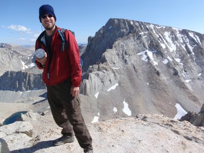 Joel, on the west summit of Russell, with the summit...
