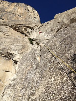John, hugging the double-crack system on the first pitch...