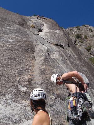 Philip and Heather and the cluster - of climbers above...