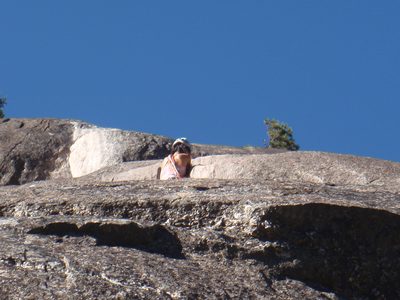 Dong, pulling a roof on pitch 4 of Nutcracker (5.8).