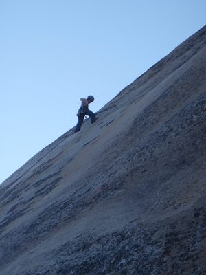Monica, cleaning the anchor and getting ready to rappel.
