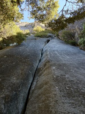 5.8 offwidth at the start of Super Slide. I forget the...