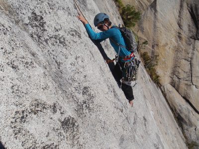 Jen working her way up pitch 4 of Super Slide.