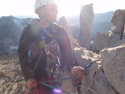 John, belaying Alex the last 30 feet to the walk off.