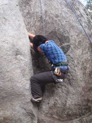 Monica, trying her hand, or fingers on Conductor Crack (5.10d).