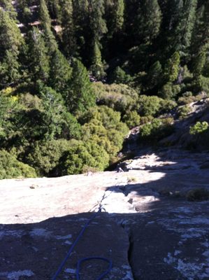 Monica climbing the second pitch of The Surprise (5.10a)...