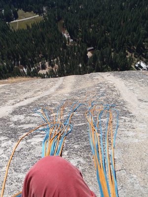Trying to manage the ropes while belaying Monica at the...