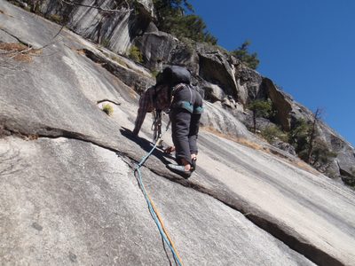 Down-climbing the last ten feet of Royal Arches to...