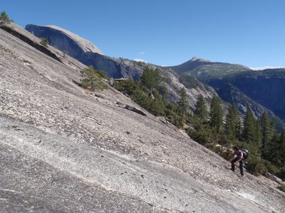 Half Dome, just coming into view from behind the slabs...
