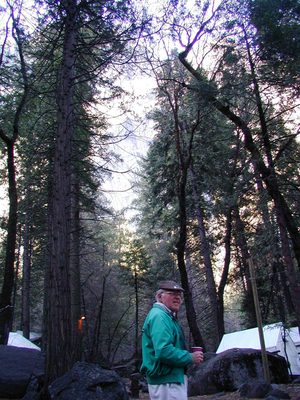 Dad finds some hot coffee to warm him up early in the morning.