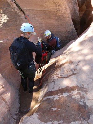 Andy on rappel while Mike sorts the rope.