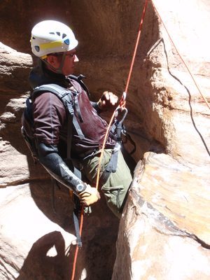 Andy double-checking his rope on the first rappel in Pine Creek.