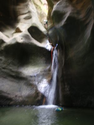 A blurry shot of one of the first small rappels in Kolob Canyon.