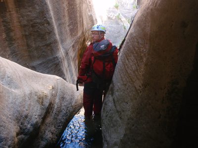 Andy, standing at the top of the final rappel.