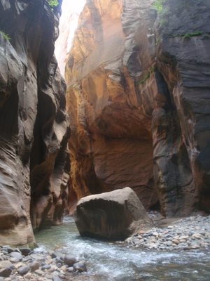 A boulder in a stream.