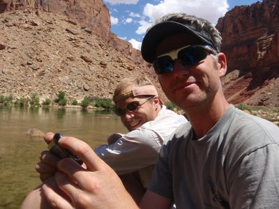 John and Andy relax on a rock and Andy attempts to get...