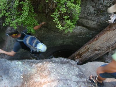 Andy jumps over a small pothole in upper Sundance...