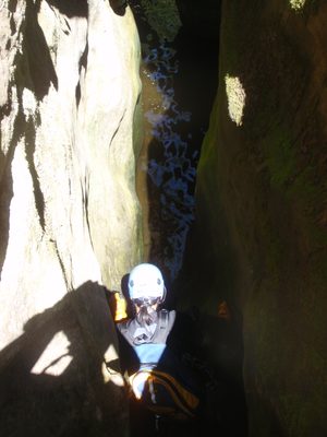 Into the abyss!  (Monica sliding down into the water.)